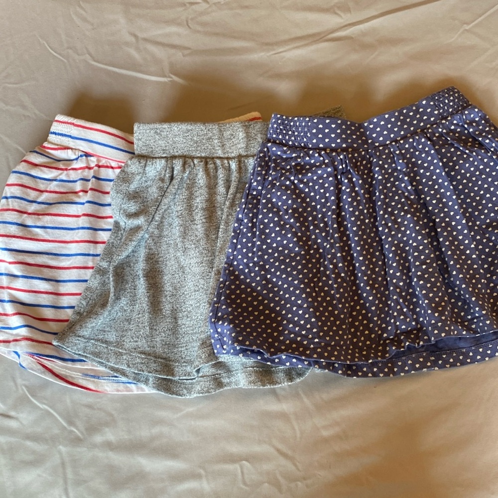 Gap Kids size XS 4-5 comfy skirt bundle. Three skirts, two with pockets.
